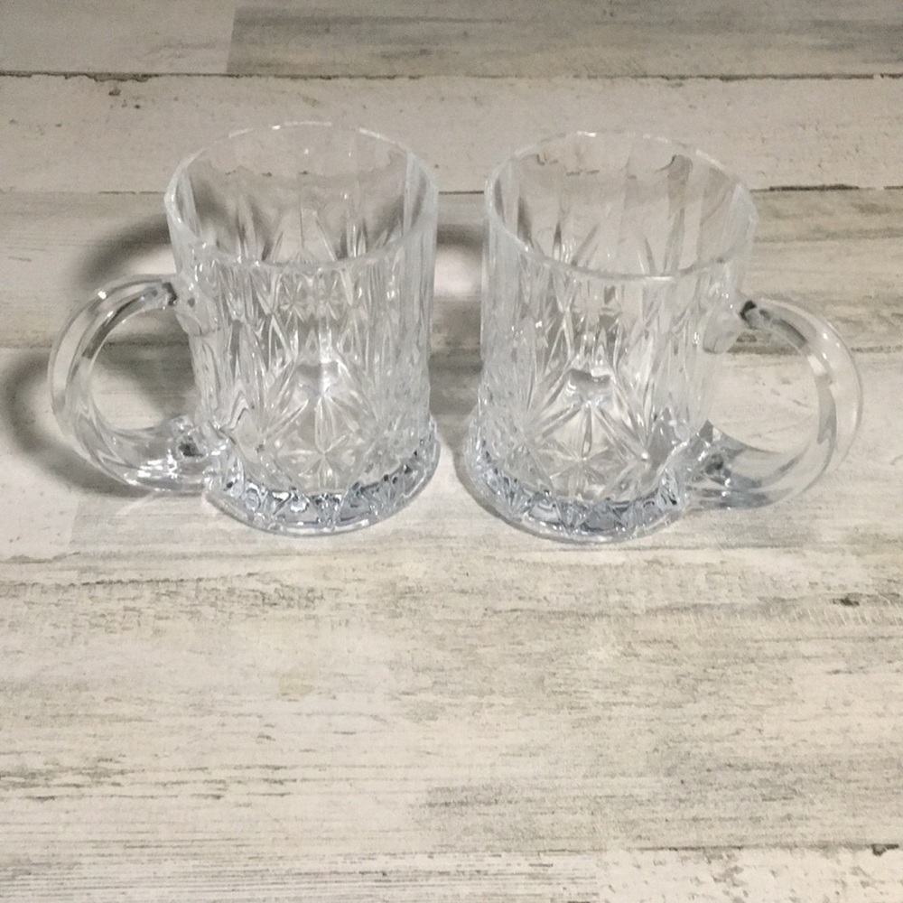 Set of two heavy crystal cut glass coffee/tea mugs with starburst pattern